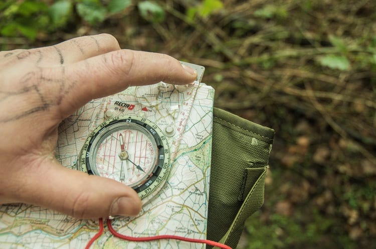 PAPER MAP AND COMPASS